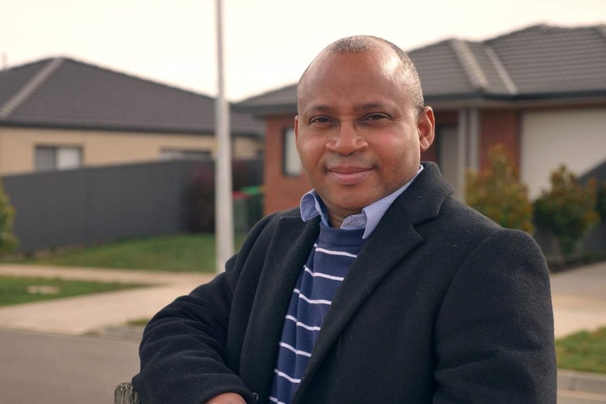 President of the Ballarat African Association Dr Michael Akindeju standing in Ballarat