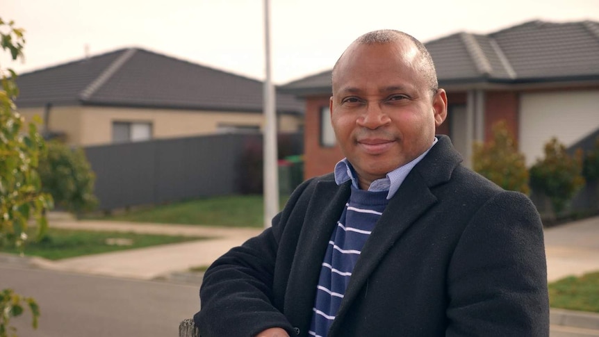 President of the Ballarat African Association Dr Michael Akindeju standing in Ballarat