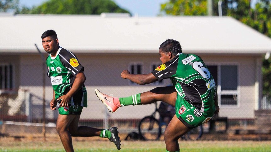 Mornington Island Raiders huddled before the game