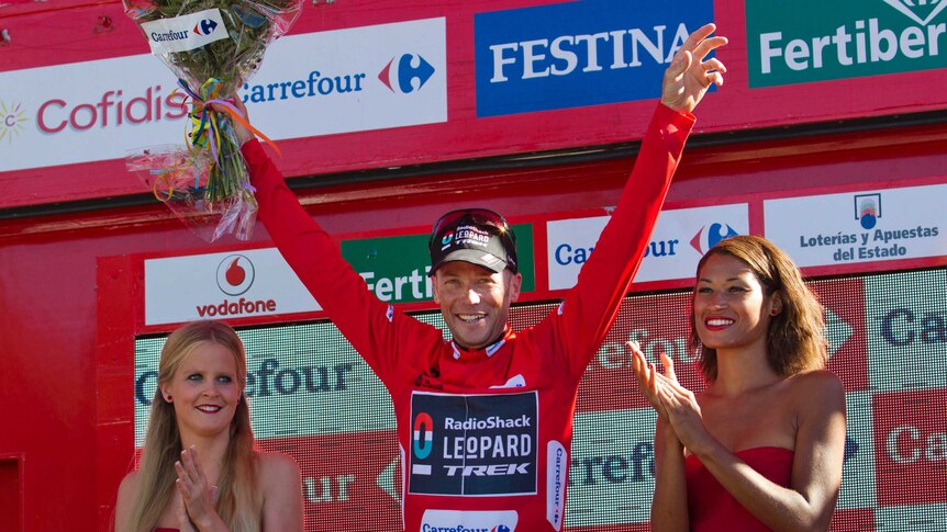 American Chris Horner from Team RadioShack has the red jersey after stage 19 of the Tour of Spain.