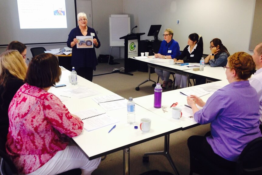 Wendy Henderson conducting a training session