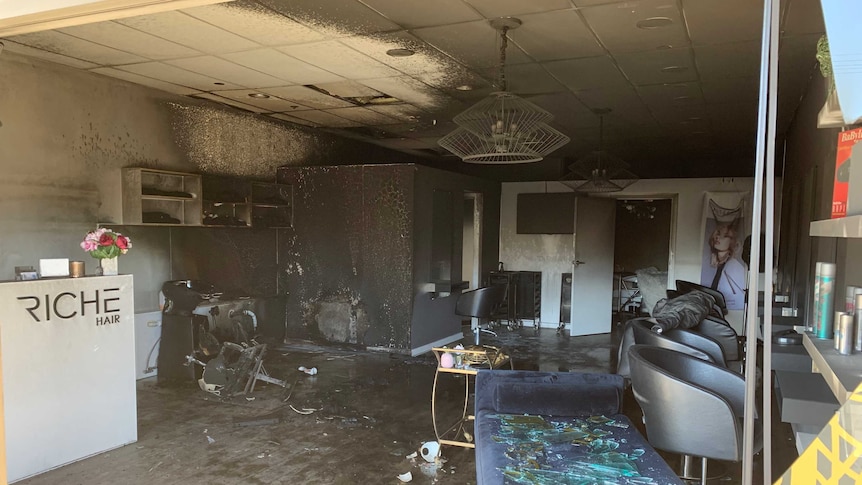 Damage inside a hair salon destroyed by fire