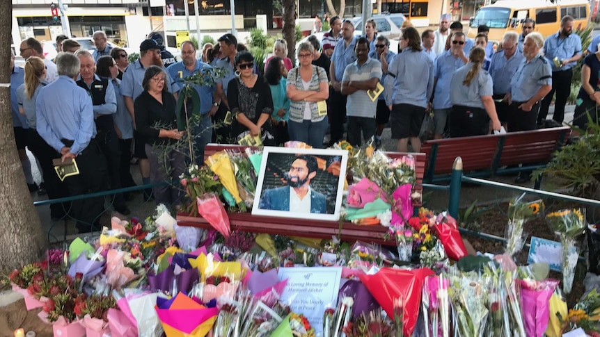 Crowd gathers for memorial service at Moorooka