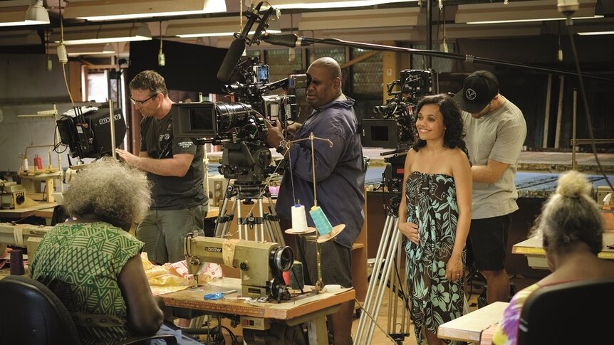 Miranda Tapsell and camera operators stand on the set of Top End Wedding.