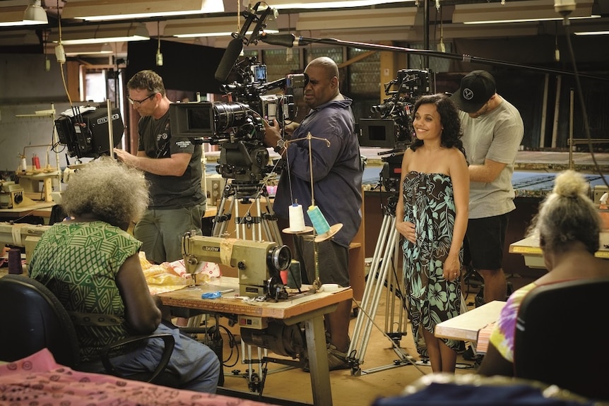 Miranda Tapsell and camera operators stand on the set of Top End Wedding.