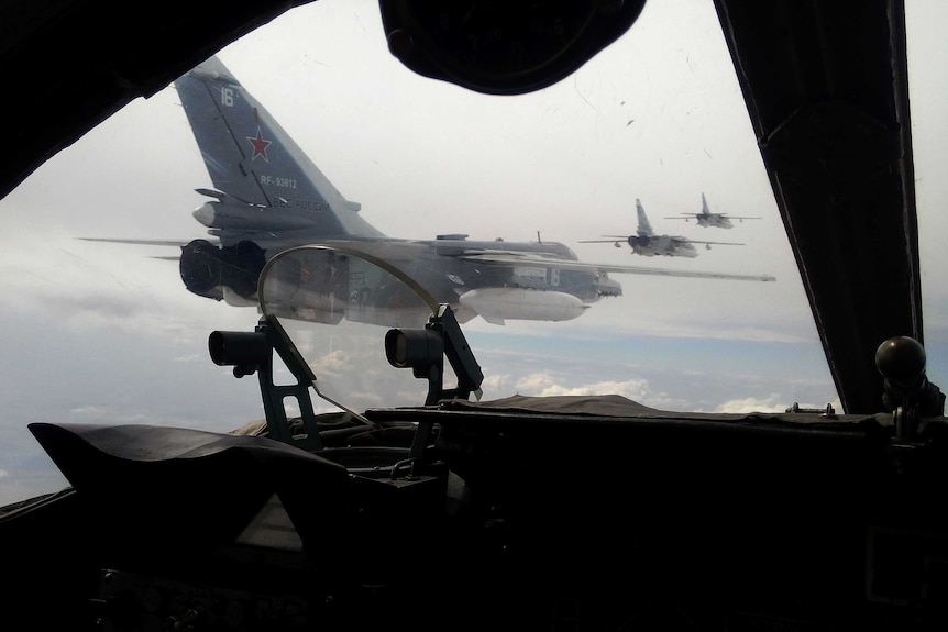 Russian Air Force SU-24 bombers fly during a military exercise in February 2015.