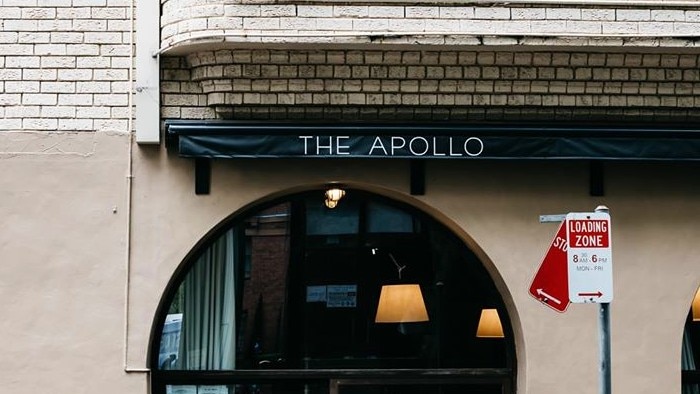 A building with a sign reading the apollo.