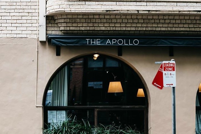 A building with a sign reading the apollo.