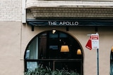A building with a sign reading the apollo.