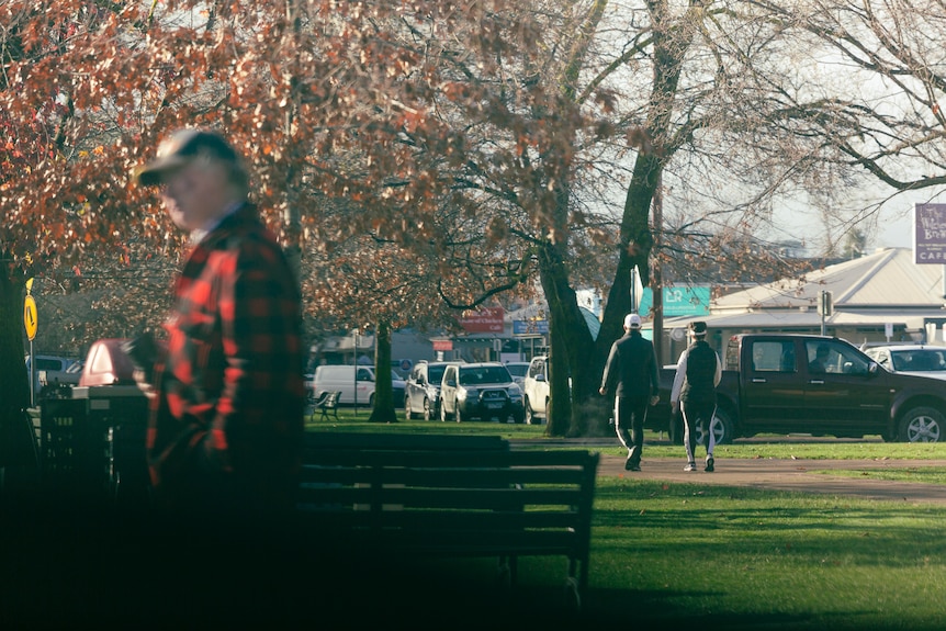 People walk in a small country town.