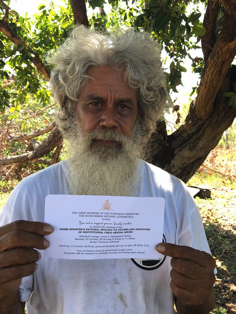 Mr Stagg holds an invitation to the national apology to victims and survivors.