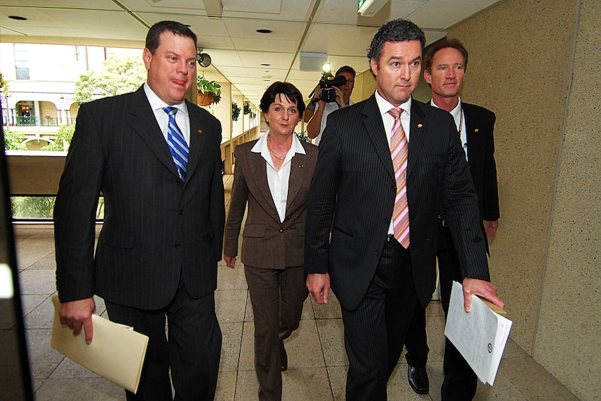 Mr Dickson (far right) at Parliament House in 2007, a year after he was originally elected for the conservatives.