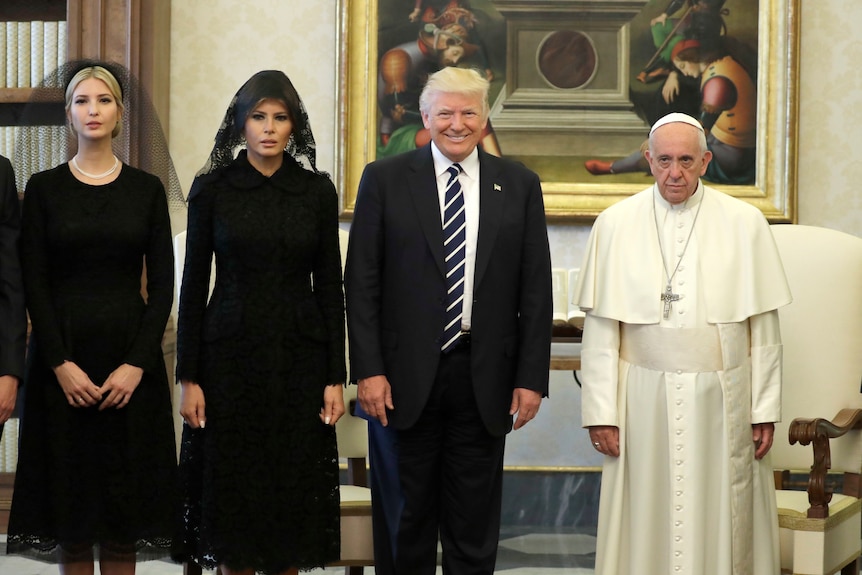 US President Donald Trump, first lady Melania Trump and daughter Ivanka Trump, left, meet with Pope Francis.
