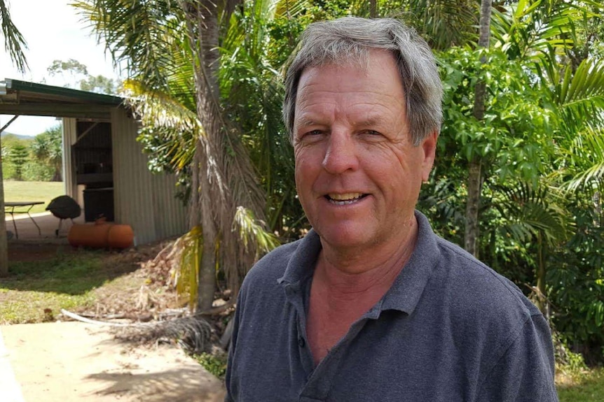 Derek Foley near the shed