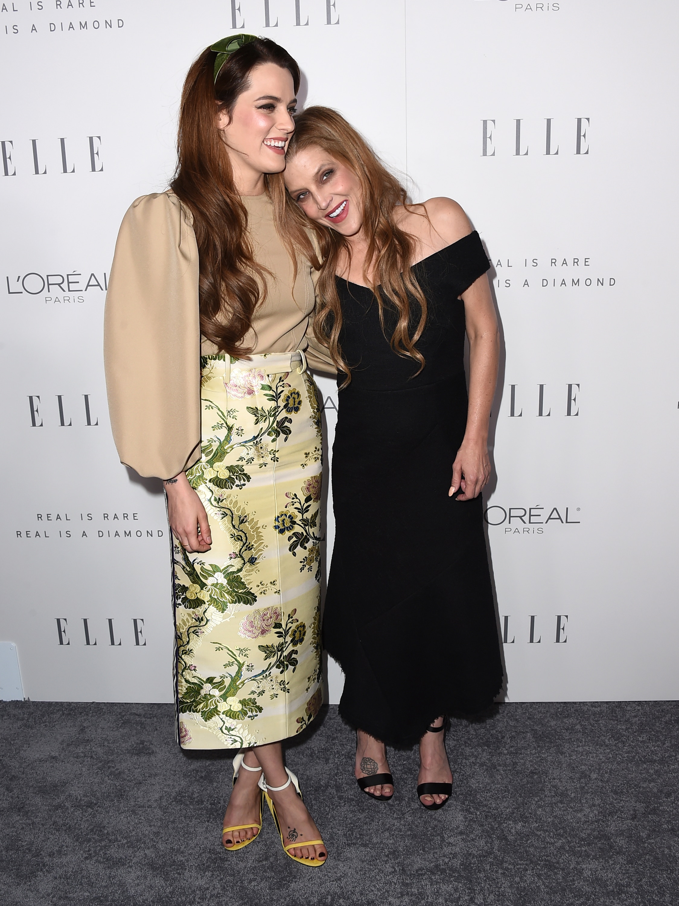 Riley Keough, left, and her mother Lisa Marie Presley arrive at the 24th annual ELLE Women in Hollywood Awards in 2017.