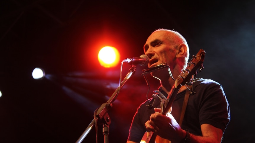 Paul Kelly performing at the Australian Stockman's Hall of Fame in Longreach.