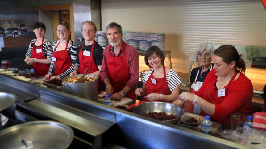 Volunteers on the serving line for Colony 47's Christmas lunch in Hobart, 2017.