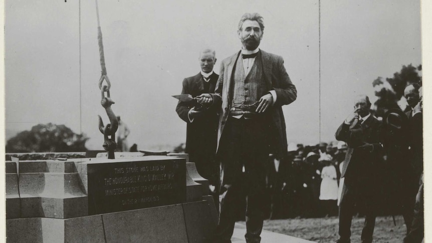 Minister for Home Affairs, King O’Malley, laying the third stone at the ceremony to name Canberra.