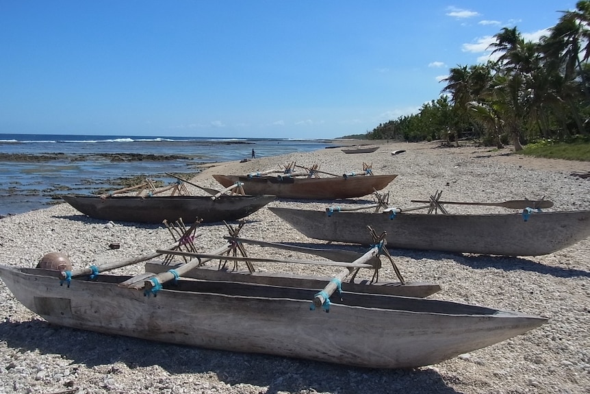 hand carved boats 