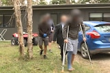 Nathan Baggaley being arrested at his house in Byron Bay.