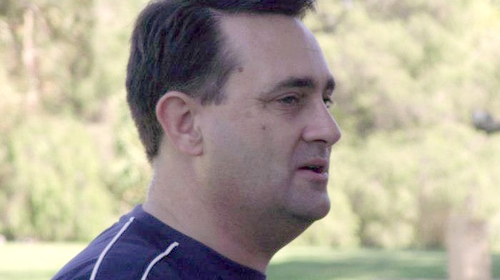 A side-on head and shoulders shot of Bradley Robert Edwards.