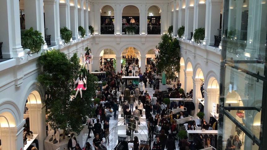 Shoppers flood H&M's flagship store in Melbourne's GPO building on its opening day.