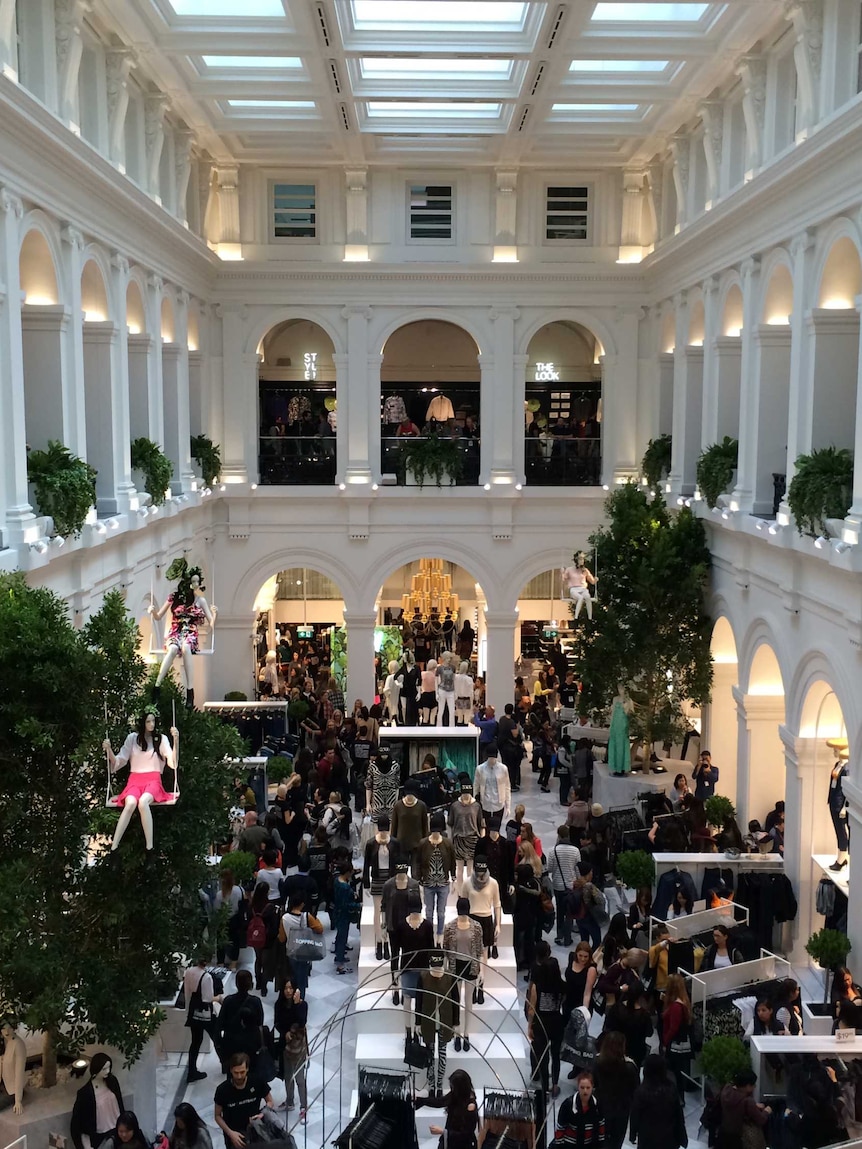 Shoppers flood H&M's flagship store in Melbourne's GPO building on its opening day.