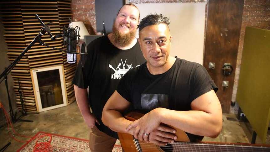 Two music teachers in a recording studio