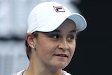 An Australian female tennis player pauses during a match.