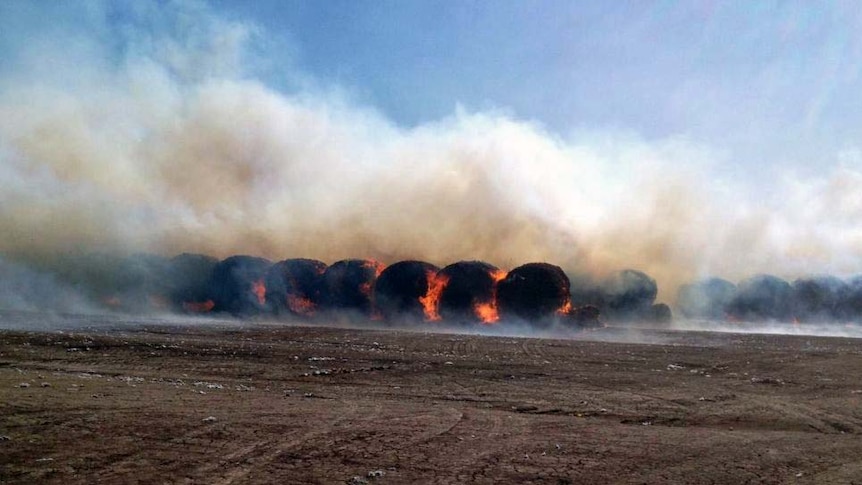 Cotton bales on fire