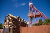 Front of the WA Museum in Kalgoorlie-Boulder showing mine headframe and old pub.