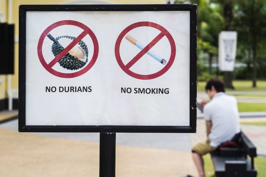 Sign showing durian and cigarettes are banned