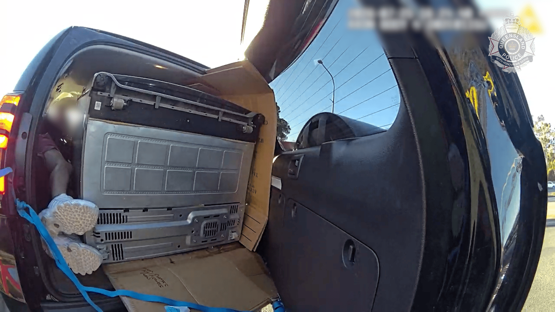 'We can see your feet': Man fined for lying next to fridge in car boot