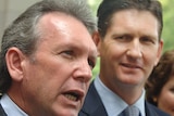 Liberal leader Mark McArdle (left), with Nationals leader Lawrence Springborg, says a Liberal-National Party would make life hard for the Qld Govt.