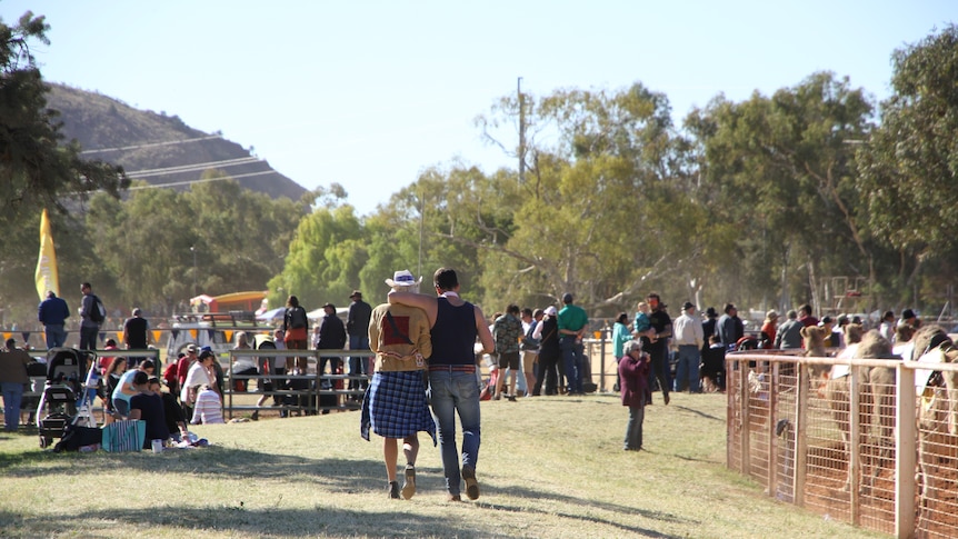 Image of Perth couple Karen Lacheta and Michael Pell strolling through the crowd