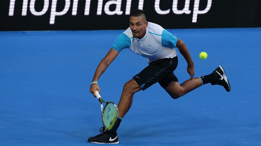 Upset win ... Nick Kyrgios stretches for a forehand against Andy Murray