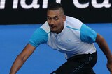 Upset win ... Nick Kyrgios stretches for a forehand against Andy Murray