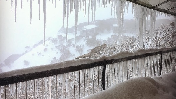 Snow on a balcony.