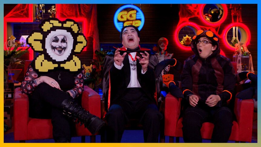 Flowey Gem, Dracula Jax and Wolf Spider Rad in the red chairs