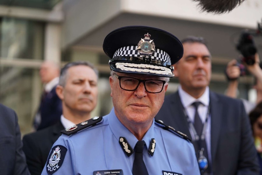 A close up of WA Police Commissioner Chris Dawson speaking to media outside court.
