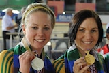 Medal rush... Australia's Kaarle McCulloch (l) and Anna Meares (r) took silver and gold in the 500m time trial