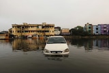 A car submerged in water.
