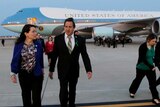 Families of victims walk from Air Force One.