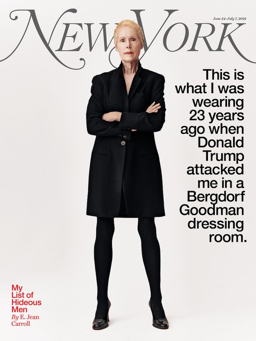 A magazine cover featuring a woman wearing a black coat standing with her arms crossed.