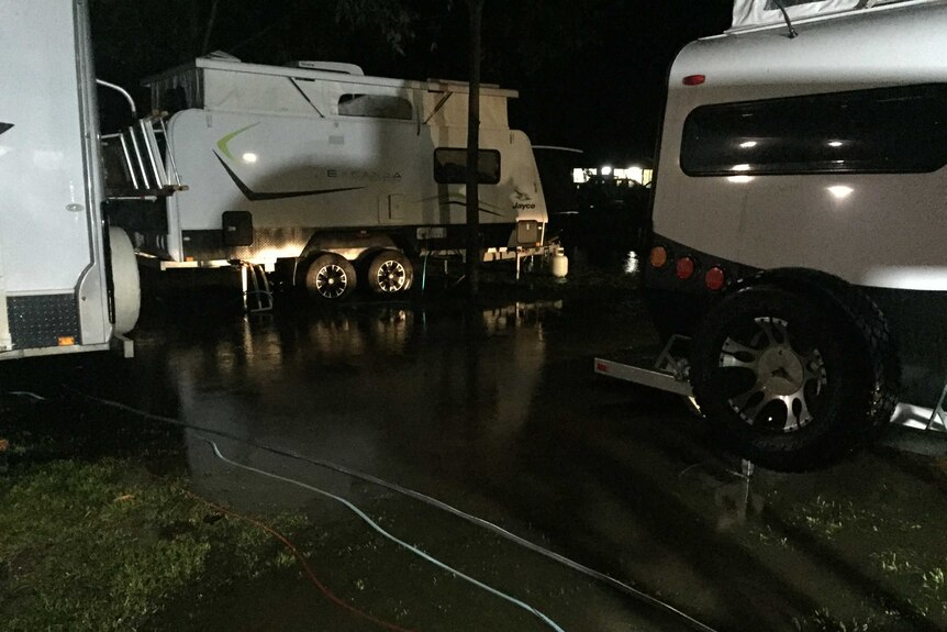 Trailers appear bumper to bumper at a camp site