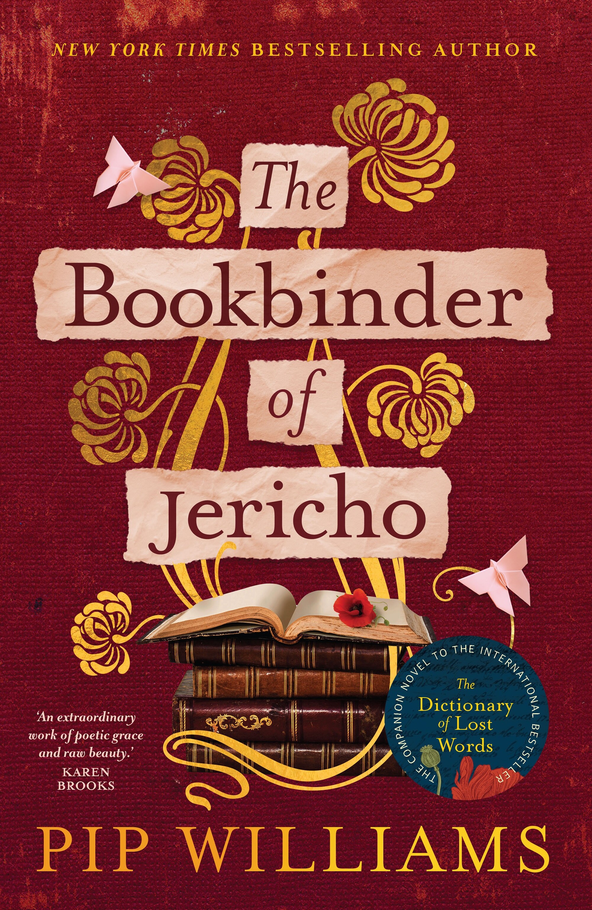 A book cover with text, an image of a stack of old-fashioned books, a decorative gold botanical pattern on a maroon background