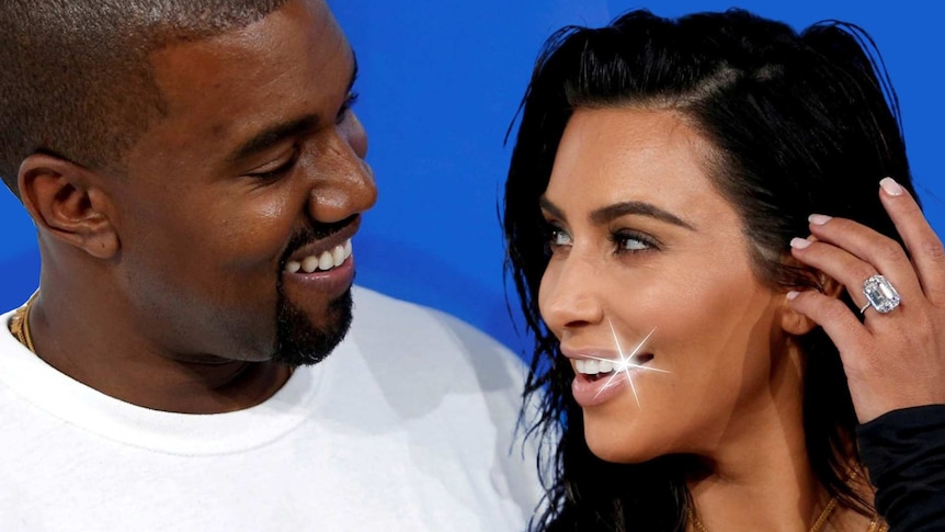 Kanye West looks at wife Kim Kardashian West for a story about what you need to know before whitening your teeth.