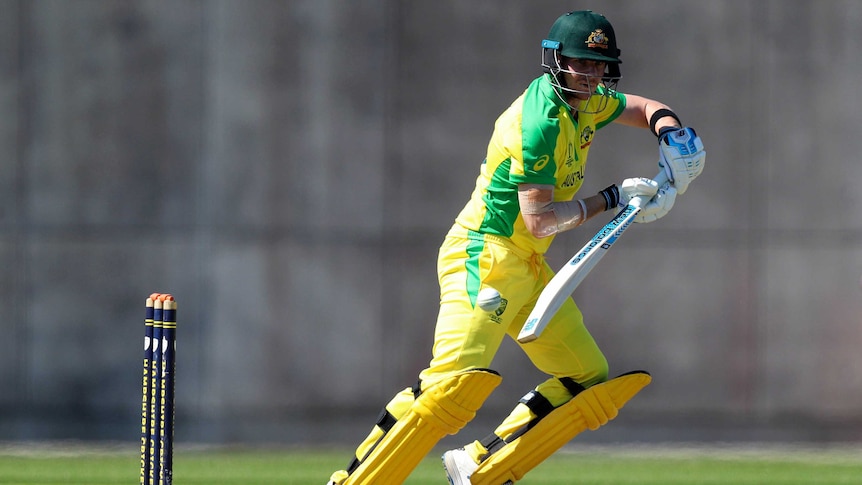 A batsman dabs the ball on the off-side during a warm-up game.