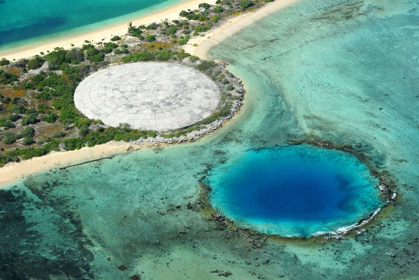 Concrete covers thousands of cubic metres of radioactive waste in a crater on Enewetak Atoll.