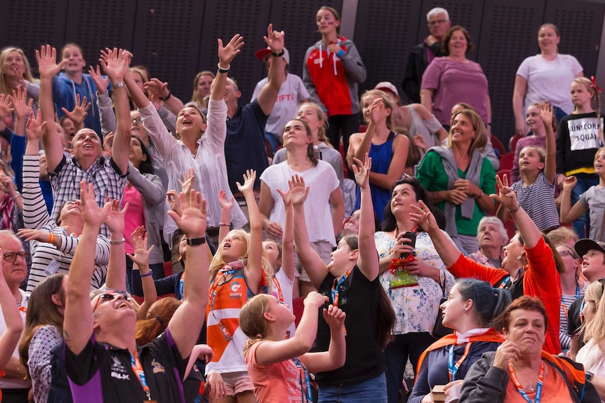 Crowd reacts during Super Netball clash